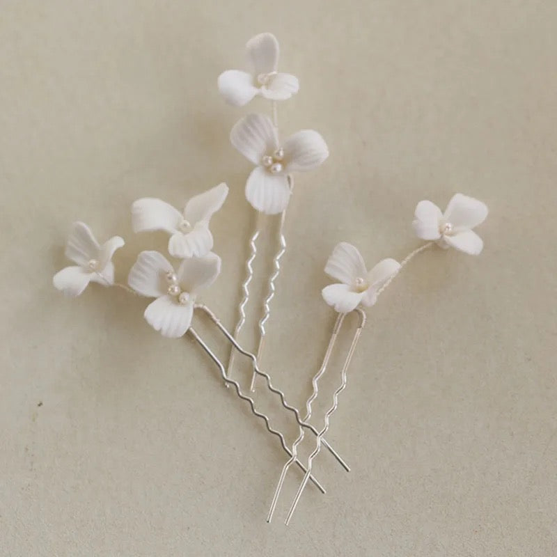 Porcelain pins