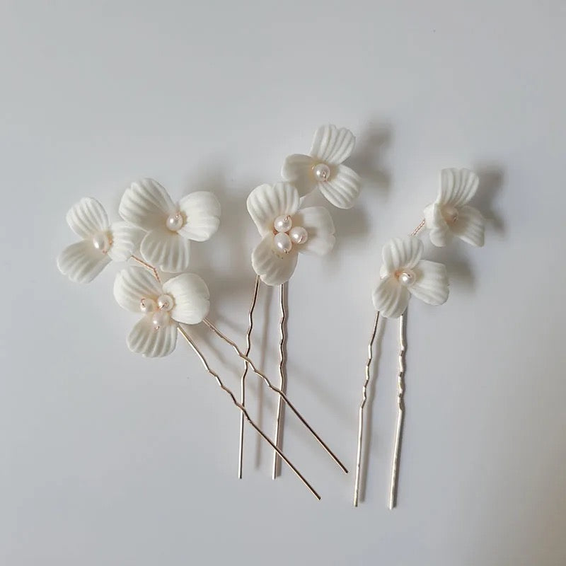 Porcelain pins